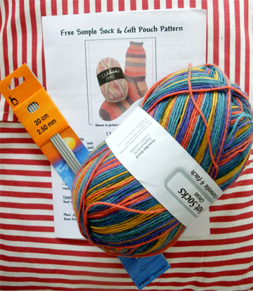 yarn, needles and sock pattern