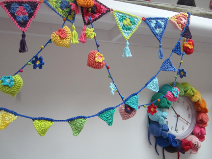 crochet bunting in Planet Penny rainbow colours