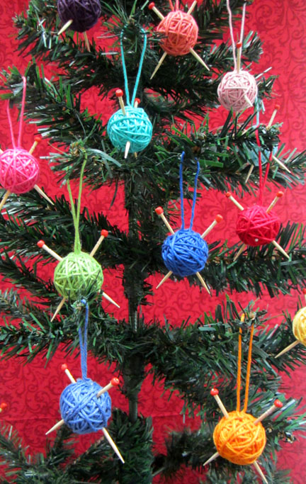 mini balls of yarn on tree for Advent Day 2