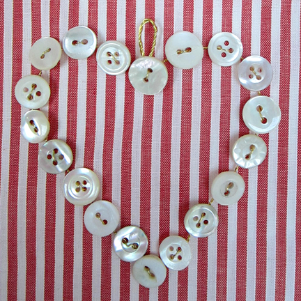 Advent Calendar Day 4 Mother of Pearl button Heart
