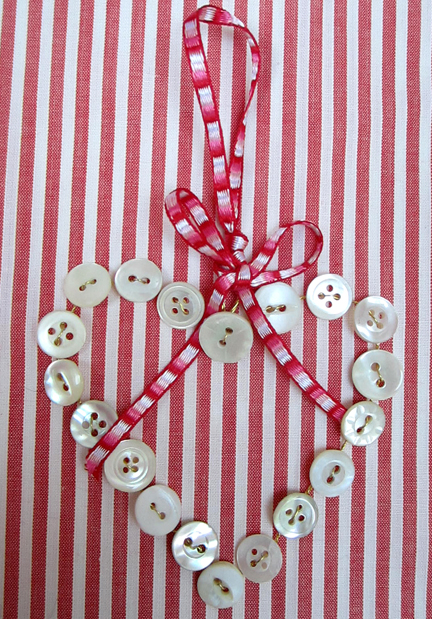 Advent Calendar Day 4 Mother of Pearl Heart with ribbon